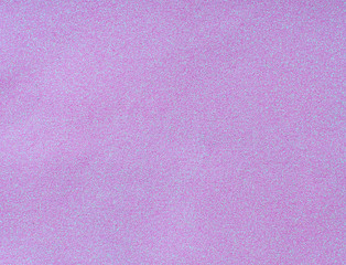 Texture of wrapping paper from  shiny glitter. Defocus, abstract background.