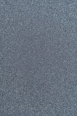 Texture of wrapping paper from  shiny glitter. Defocus, abstract background.