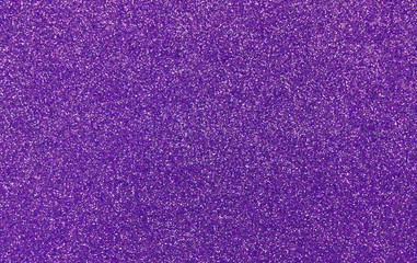 Texture of wrapping paper from  shiny glitter. Defocus, abstract background.