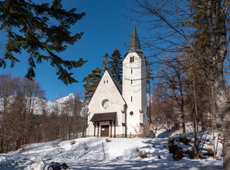 Fototapeta na wymiar Front view of catholic church in ski resort Tatrzanska Lomnica, Slovakia