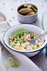 Russian olivier salad with meat and vegetables