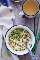 Russian cold soup okroshka with meat and vegetables