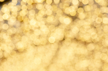 Orange bokeh from the bulb with blurred pattern background