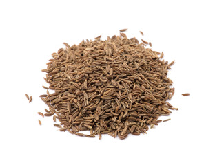 Pile of cumin seeds isolated on white background