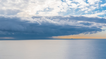Obraz premium The Mediterranean Sea, bay of Nice, panorama of a storm and a ship in background