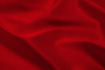 Dekokissen red satin or silk fabric as background © nata777_7