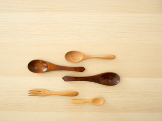 Wooden spoon on a wooden table