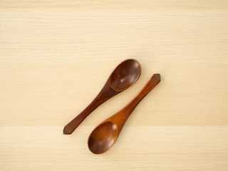 Wooden spoon on a wooden table