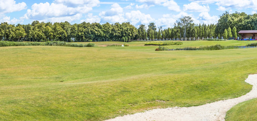 Fototapeta na wymiar Panorama of a fragment of a golf course in Mezhigirje near Kiev, Ukraine.
