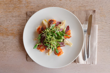Appetizer with salmon, artichokes and lettuce shot from above