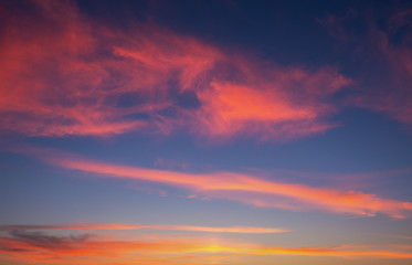 Naklejka na ściany i meble Fiery orange sunset sky. Beautiful sky.