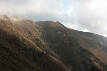 thick and dense fog between the peaks of the Apuan Alps in Tuscany