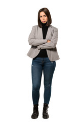 A full-length shot of a Young business woman with sad and depressed expression over isolated white background