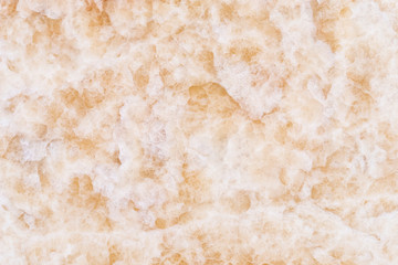 Abstract background from golden marble texture. Luxury backdrop.