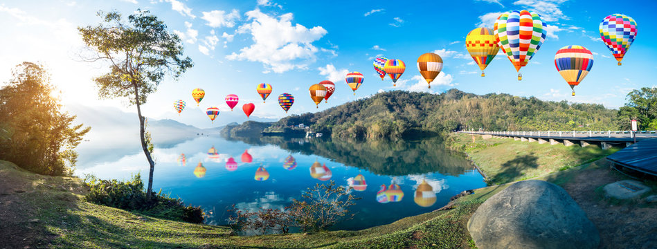 Colorful hot air balloon fly over beautiful landscape view of Sun Moon Lake 4