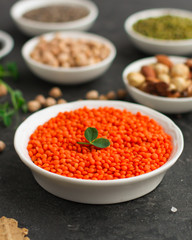 Lentils orange, healthy food concept (legumes, greens, spinach, micro greens and more) superfood. Food background