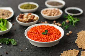 Lentils orange, healthy food concept (legumes, greens, spinach, micro greens and more) superfood. Food background