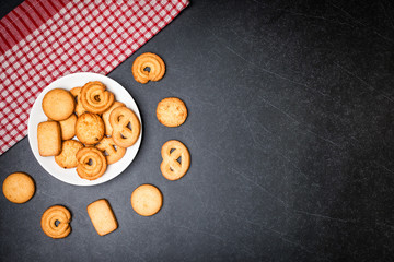 Cookies on Plate with Black stone table background.
