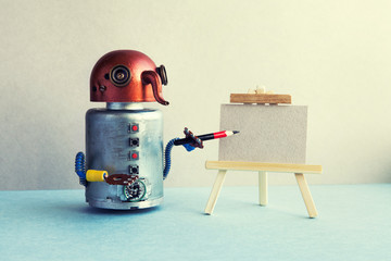 Artificial intelligence robotic concept. Funny robot artist begins to create a drawing with a...