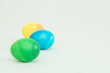 ombre colored easter eggs with soft background