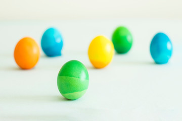 ombre colored easter eggs with soft background