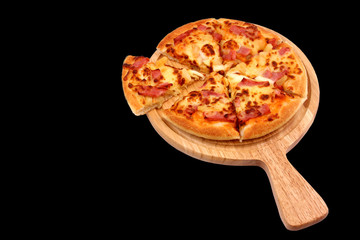 Italian pizza isolated on black background.