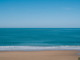 Shore of the beach with clear water