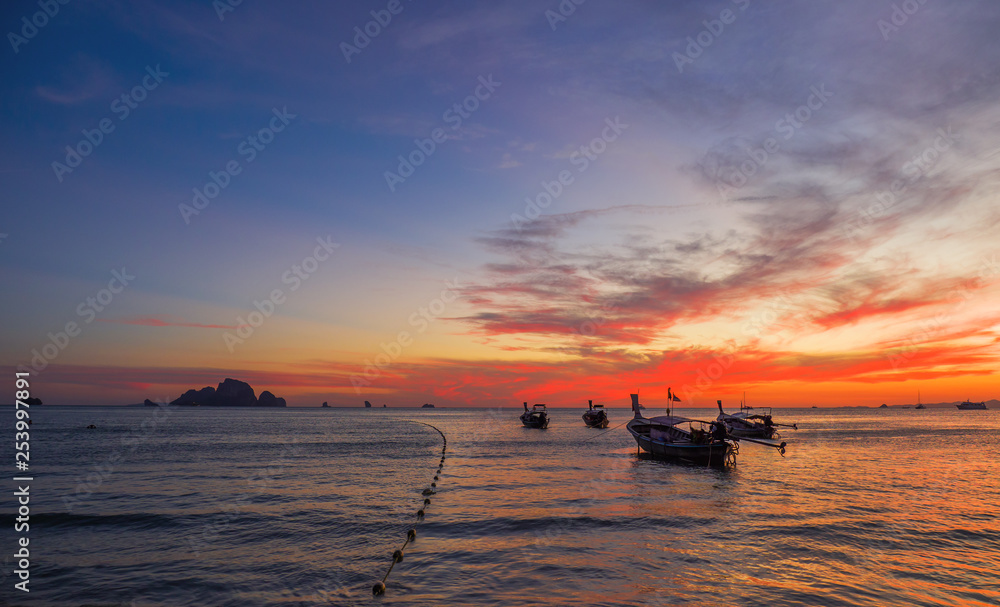 Wall mural long tail boat at sunset in thailand - Wall murals