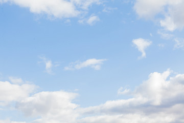 Blue sky background with clouds. White clouds on blue sky