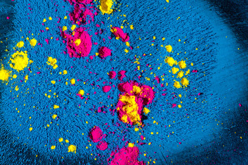 Drops of toner on cyan background
