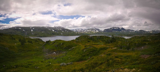 Fototapeta na wymiar Panoramic view to Hardangervidda plateau and Votna lake at Norway