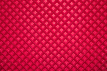 pink texture of wafers. pink rhombuses.Texture of small tiles.