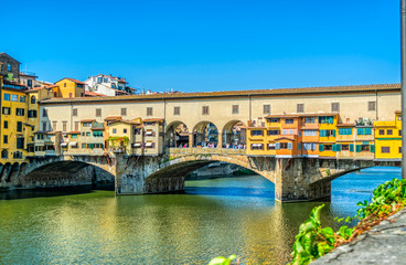view on Ponte Vecchio over Arno river in Florence, Italy