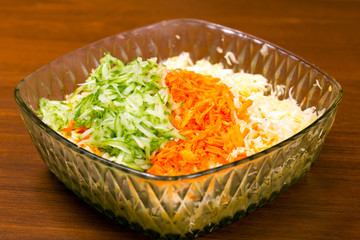 Summer vegetable salad from cabbage, cucumbers and carrots