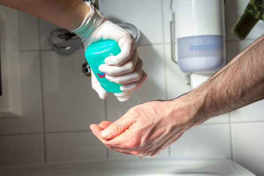 correct hands disinfection with disinfectant and water