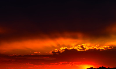Beautiful sunset with dramatic clouds on the sky