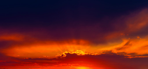 Beautiful sunset with dramatic clouds on the sky