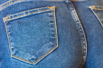 Female ass in jeans closeup