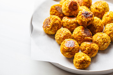 Vegan bean meatballs on a white background.