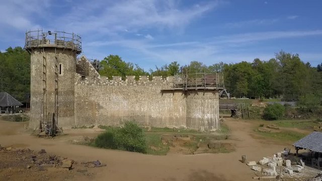 Aerial view of the construction site of the medieval castle Guedelon, France.