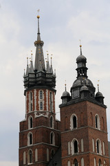 Fototapeta na wymiar bell tower of Krakow in Poland and the Church of Our Lady St.Mar