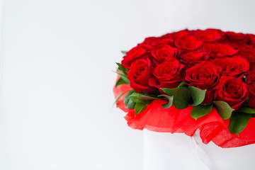 bouquet of red rosesbouquet of red roses in a white box on a white background isolated