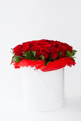 bouquet of red rosesbouquet of red roses in a white box on a white background isolated