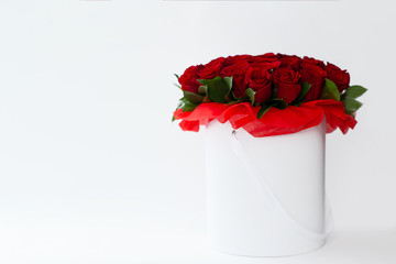 bouquet of red rosesbouquet of red roses in a white box on a white background isolated