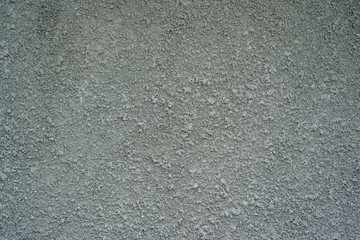 rough wall surface treated with concrete plaster can be used as background or texture for your ideas.