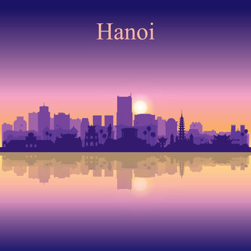 Hanoi city silhouette on sunset background
