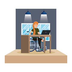 young man in wheelchair working in the office