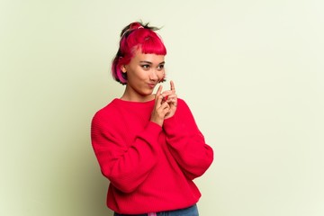 Young woman with red sweater scheming something