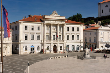 Fototapeta na wymiar Municipal Hall government building in Tartini Square Piran Slovenia with Statue and monument to Giuseppe Tartini