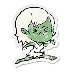 distressed sticker of a annoyed cartoon vampire girl